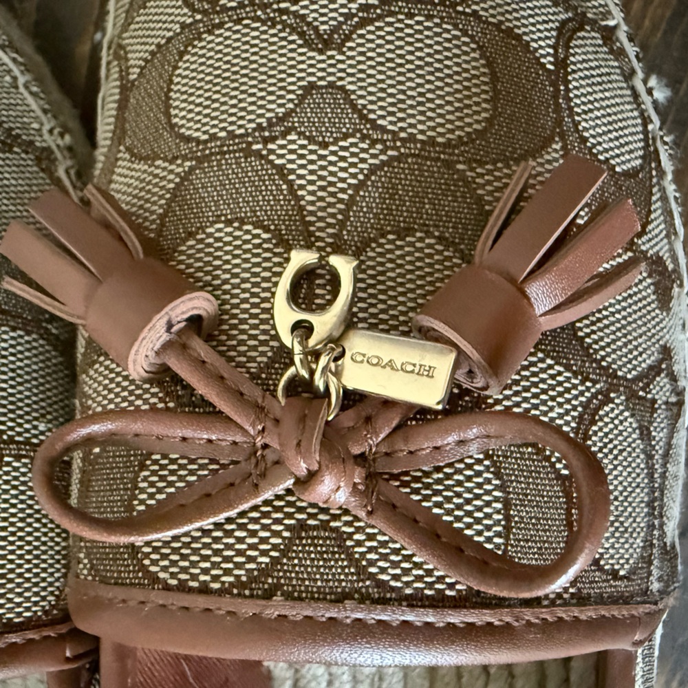 Coach Tan and Brown Monogram Loafers. Women’s size 7 1/2 $75
